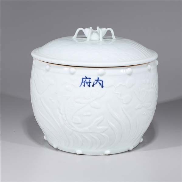 Appraisal: Chinese white glazed porcelain covered jar with allover fish designs