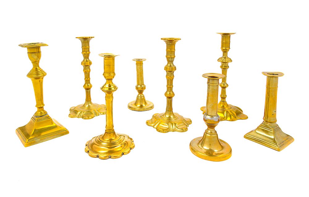 Appraisal: Eight English Brass Candlesticks Eight English Brass Candlesticks th Century