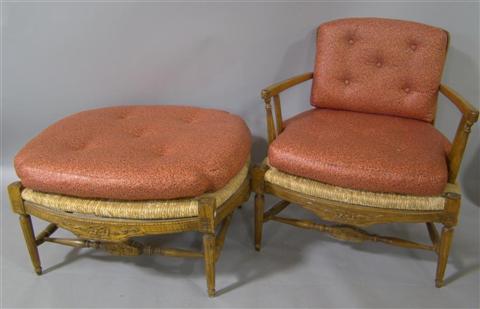 Appraisal: COUNTRY FRENCH STYLE EASY CHAIR AND OTTOMAN WITH RUSHED SEATS