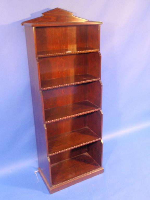 Appraisal: A stained pine waterfall bookcase wide high