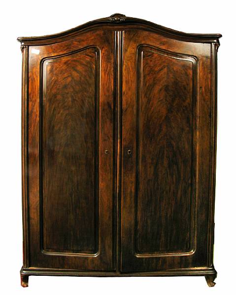 Appraisal: A walnut wardrobe second quarter th century height ft in