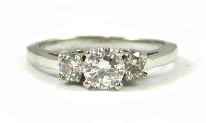 Appraisal: DIAMOND AND FOURTEEN KARAT WHITE GOLD RING set with three