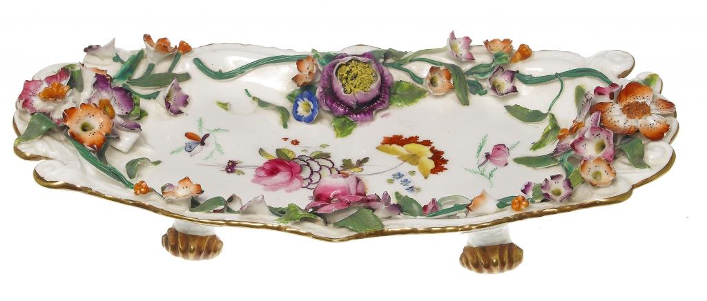 Appraisal: A STAFFORDSHIRE FLORAL ENCRUSTED PEN TRAY painted with a central