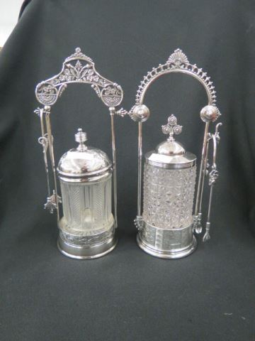 Appraisal: Victorian Silverplate Pickle Castors clear pattern glass inserts