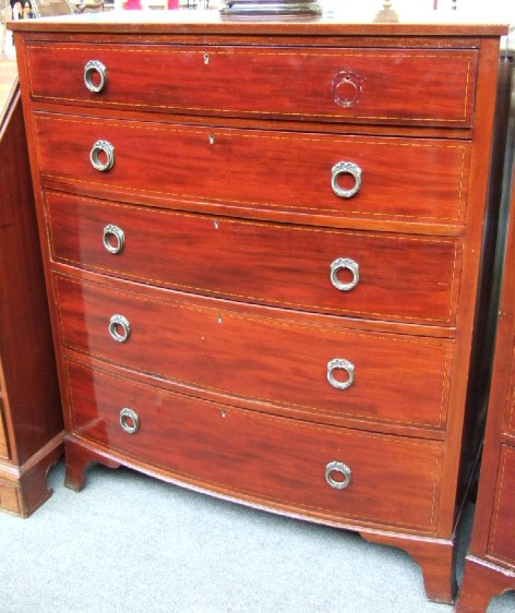 Appraisal: A mid th century mahogany bowfront chest of drawers the