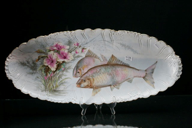 Appraisal: A pair of German porcelain handpainted eliptical fish plates