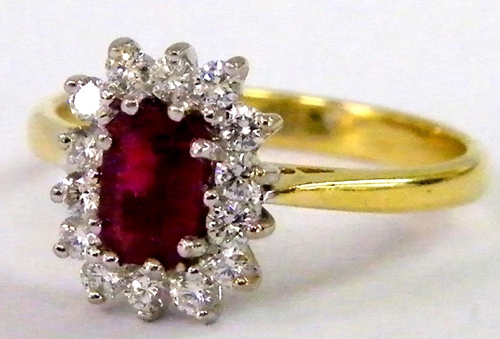 Appraisal: ct emerald shape ruby and diamond cluster ring size M