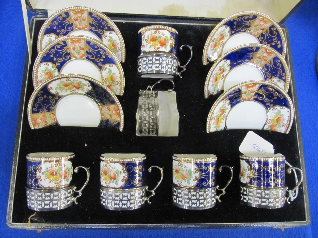 Appraisal: Cased set of Salon China silver mounted coffee cans and