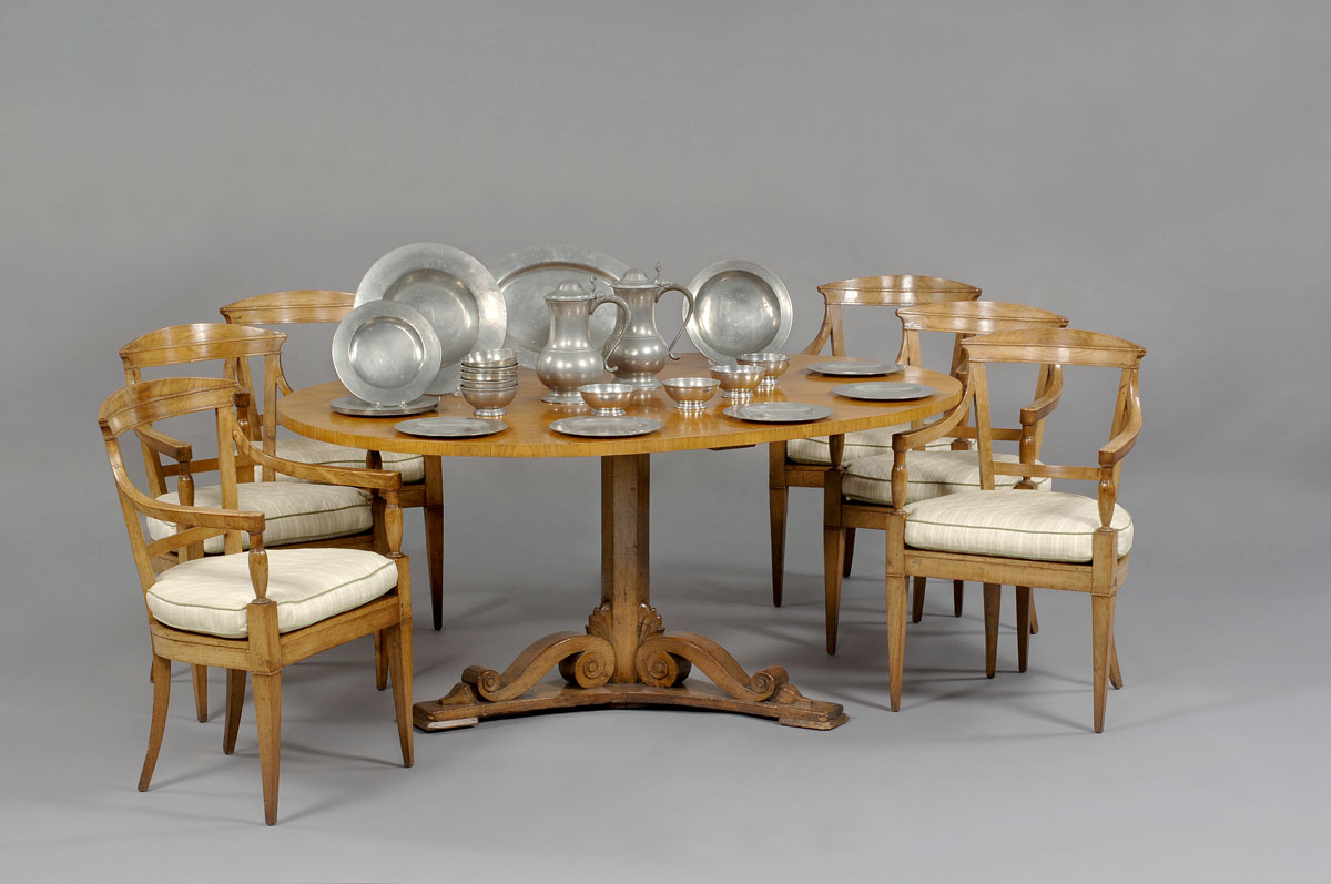 Appraisal: ITALIAN NEOCLASSICAL FRUITWOOD DINING TABLE The oval top above a