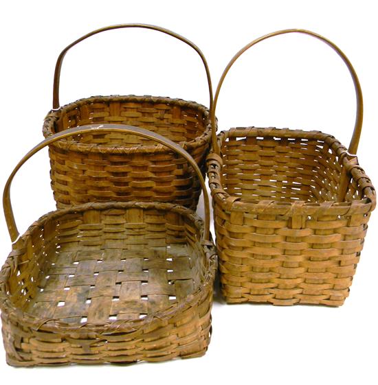 Appraisal: Three splint woven baskets with arch handles minor loss ''