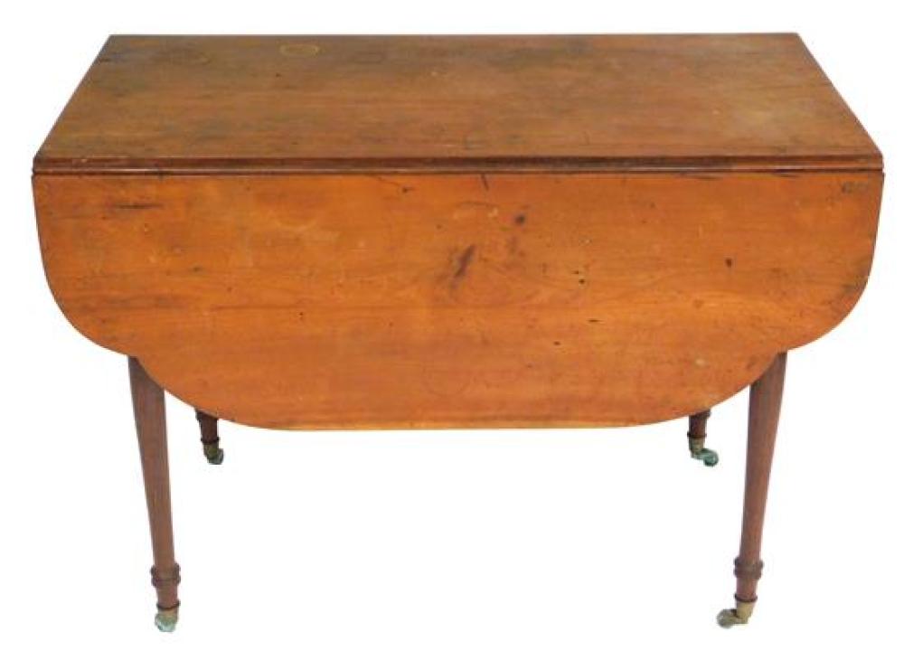 Appraisal: American Pembroke table th C shaped drop leaves single drawer