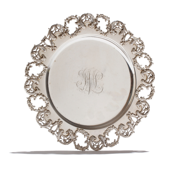 Appraisal: Sterling silver serving plate with pierced scrolling relief border Star