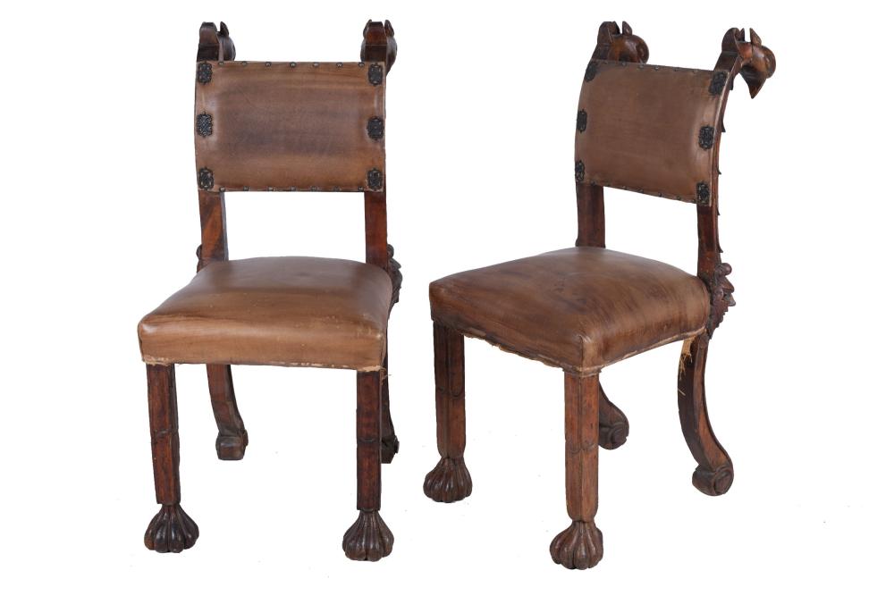 Appraisal: PAIR OF CONTINENTAL CARVED WALNUT SIDE CHAIRSwith brown leather seats