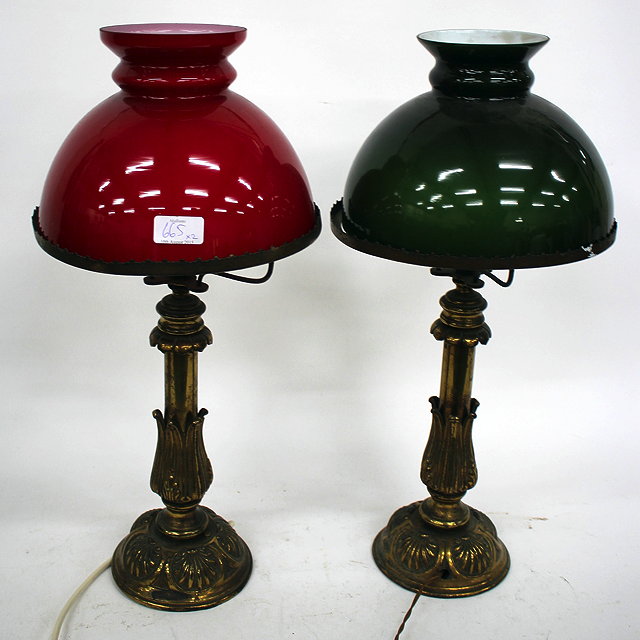 Appraisal: A PAIR OF OLD BRASS TABLE LAMPS with acanthus leaf