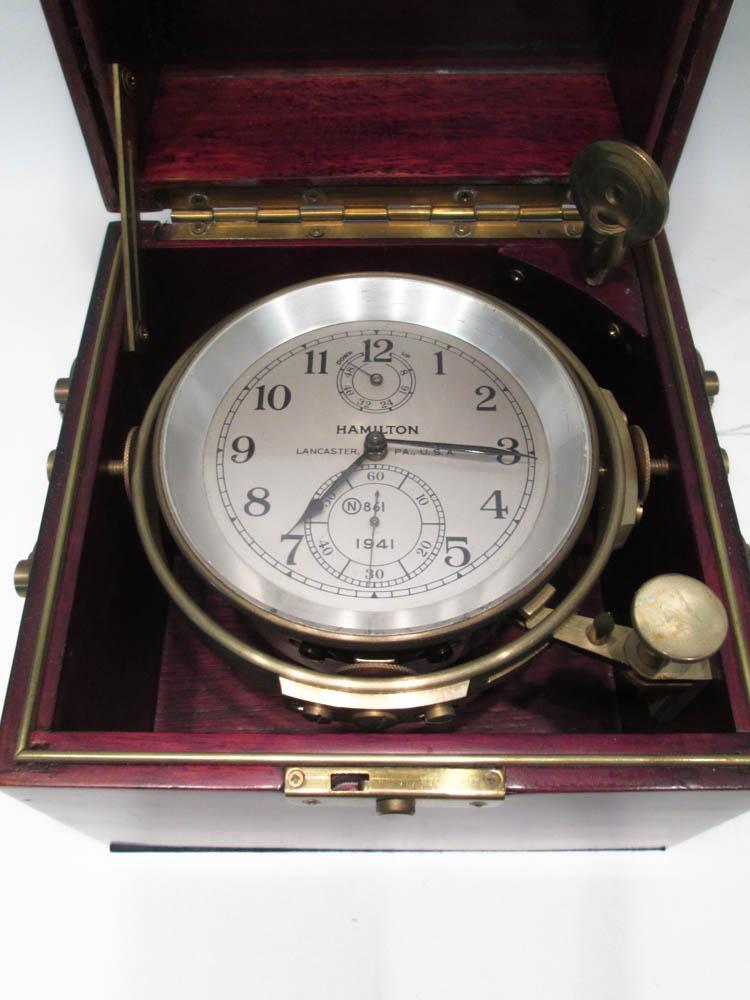 Appraisal: HAMILTON BRASS MOUNTED CHRONOGRAPH CLOCK in a mahogany case measuring