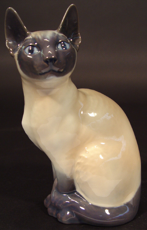 Appraisal: Royal Copenhagen china Siamese cat with hand painted decoration printed