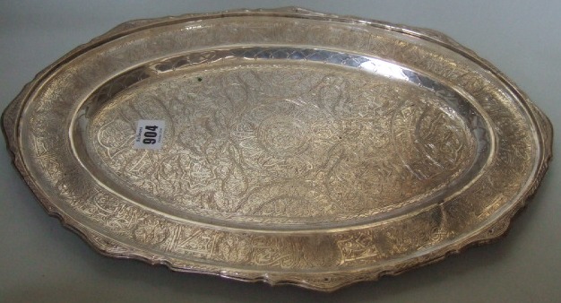 Appraisal: An Egyptian oval meat plate with scrolling and patterned decoration