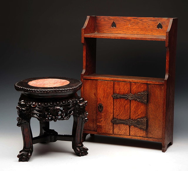 Appraisal: A CHINESE CARVED HARDWOOD JARDINIERE STAND with pink marble inset