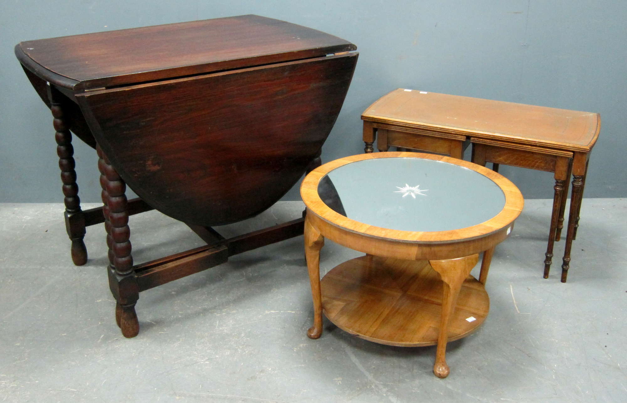 Appraisal: Oak gateleg table walnut circular table with mirrored centre and