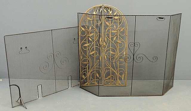 Appraisal: Two wire fire screens largest x and a wrought iron