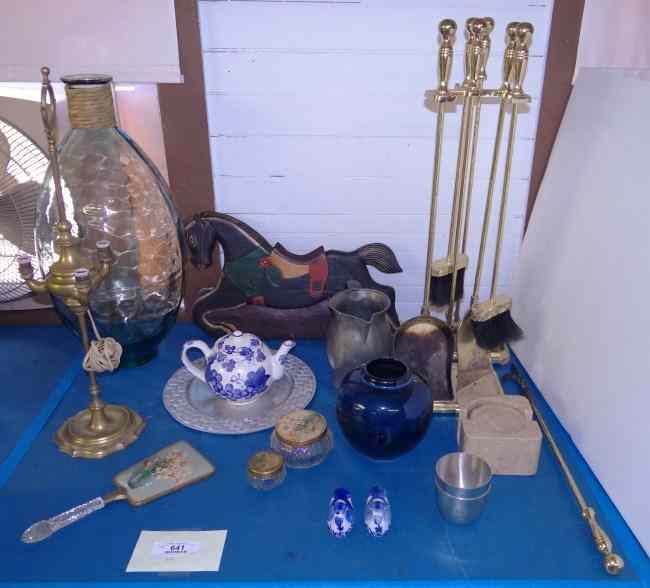 Appraisal: Misc table lot including fireplace equipment teapot large glass bottle