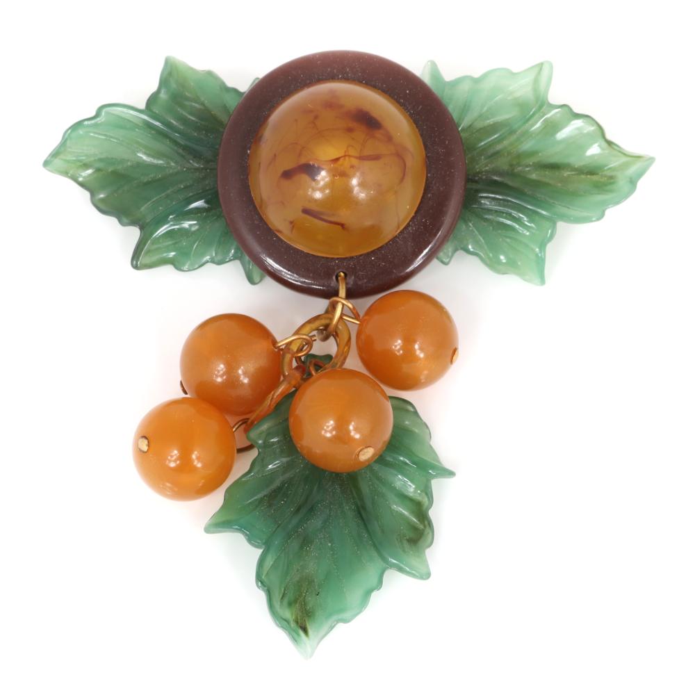 Appraisal: STACY PORTER ASSEMBLED VINTAGE JEWELRY PIN WITH CARVED BUTTERSCOTCH BAKELITE