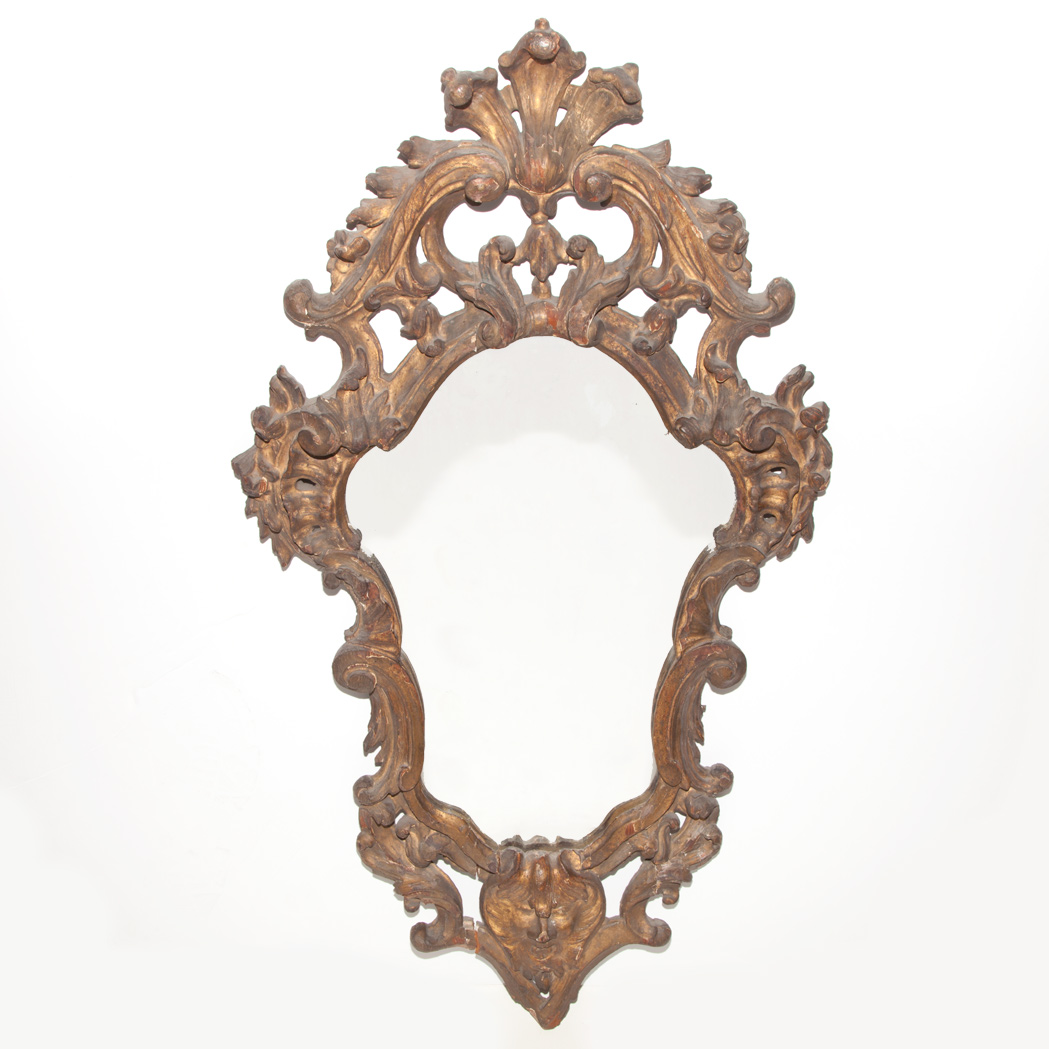 Appraisal: Italian Rococo Style Giltwood Mirror The cartouche-shaped mirror plate within