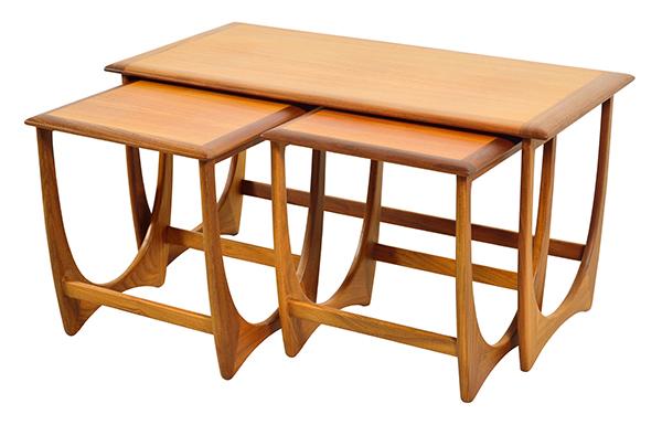 Appraisal: NEST OF ENGLISH G-PLAN TABLES c s three teak tables