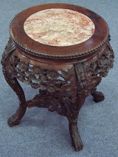 Appraisal: A Chinese hardwood jardini re stand pierced and carved the