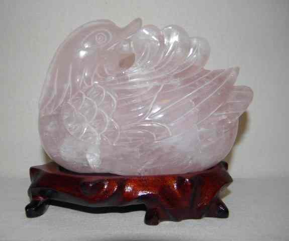 Appraisal: Carved rose quartz duck figurine with etched details Includes carved