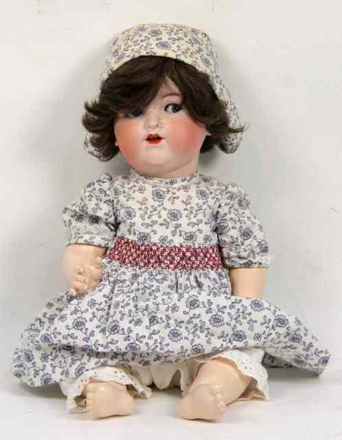 Appraisal: An Armand Marseille bisque headed doll A M made in