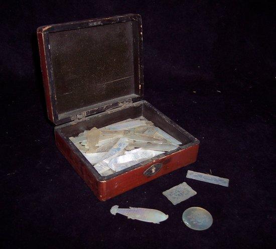 Appraisal: A small quantity of mother-of-pearl gaming tokens various in a