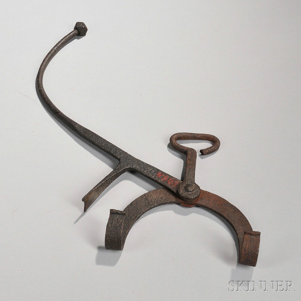 Appraisal: Wrought Iron Kettle Tilter America late th early th century