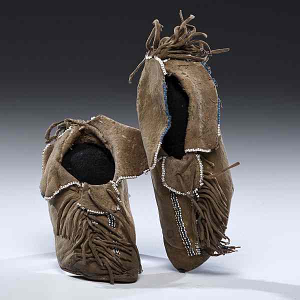 Appraisal: Kiowa Child's Beaded Hide Moccasins thread and sinew-sewn and beaded