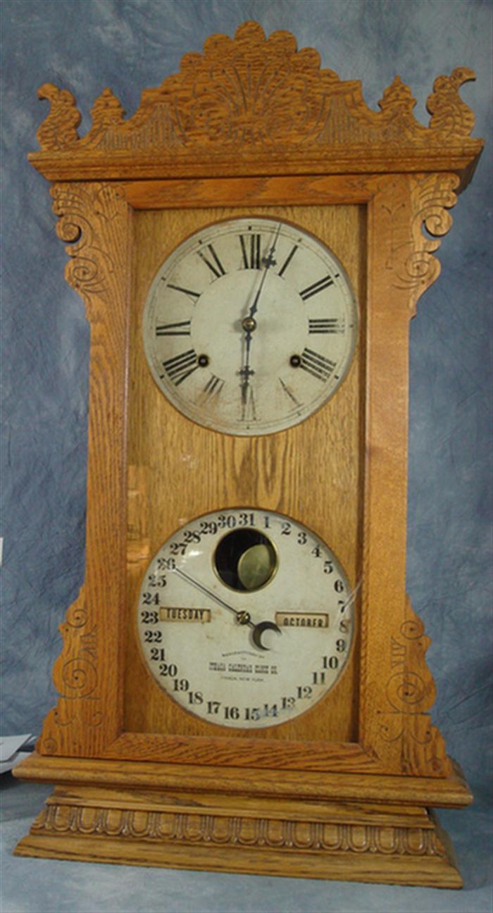 Appraisal: Ithaca oak Mantle Index double dial calendar clock h Estimate