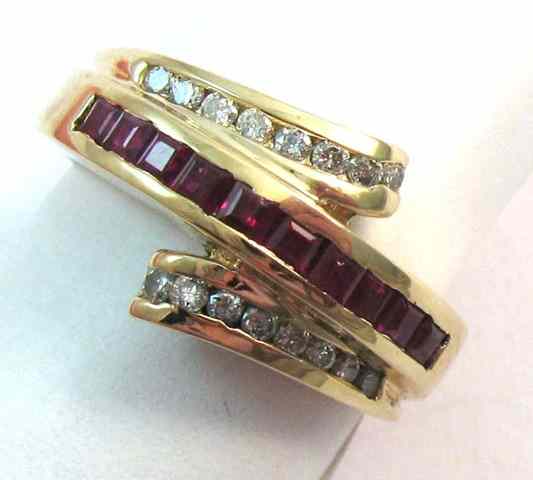 Appraisal: RUBY DIAMOND AND FOURTEEN KARAT GOLD RING set with ten