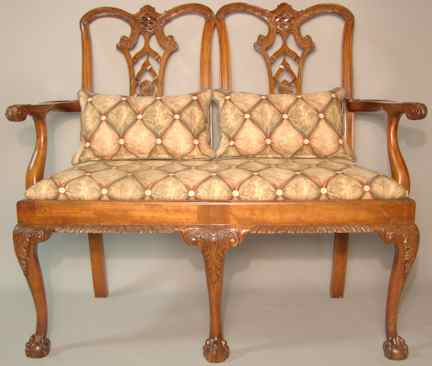 Appraisal: CHINESE CHIPPENDALE STYLE CARVED MAHOGANY DOUBLE-CHAIR BACK SETTEE the shaped