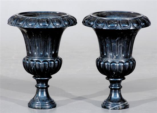 Appraisal: Pair Classical style black marble urns lobed body with flared