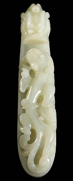 Appraisal: A pale greenish-white jade belt hook th Century Finely carved