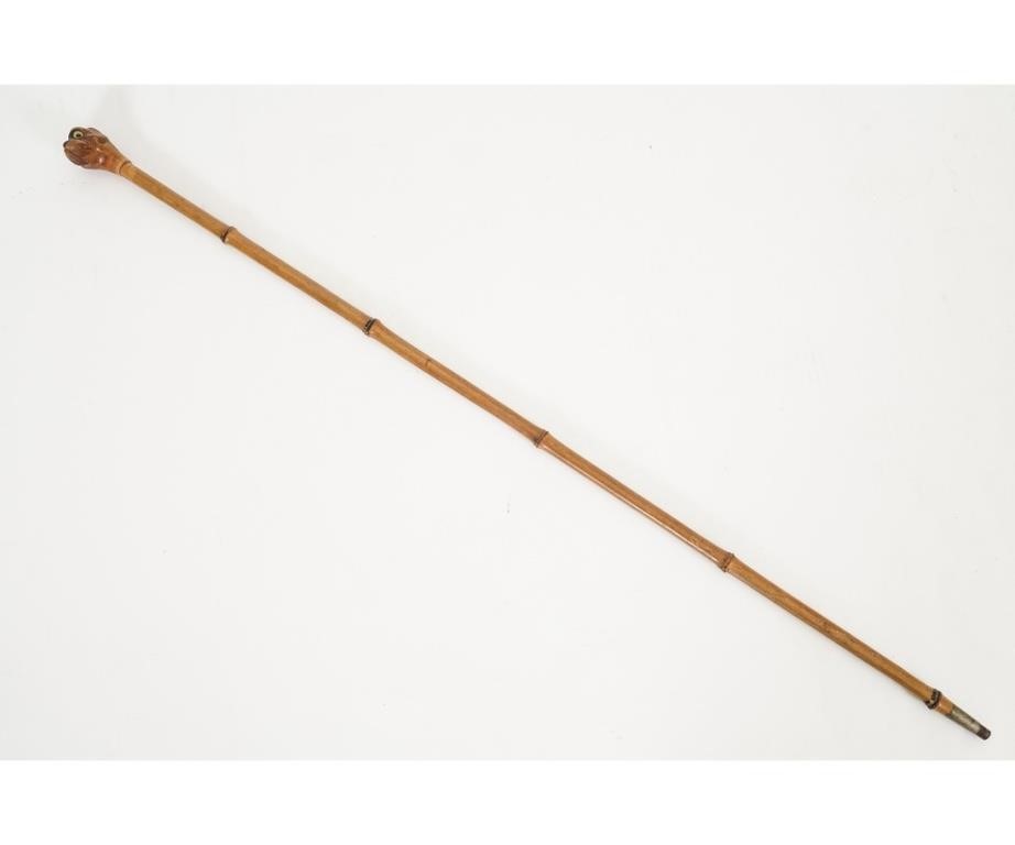 Appraisal: Bamboo walking stick late th c with carved bulldog grip