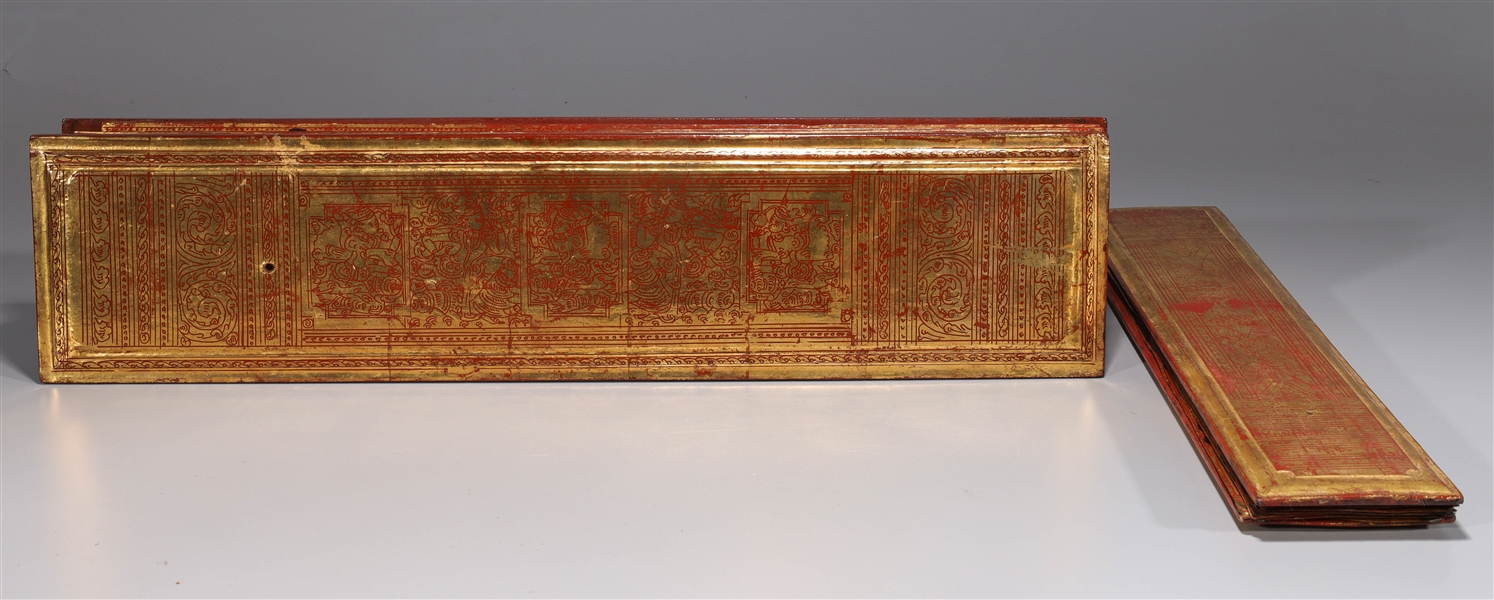 Appraisal: Two antique Thai prayer books each with gilt cover the