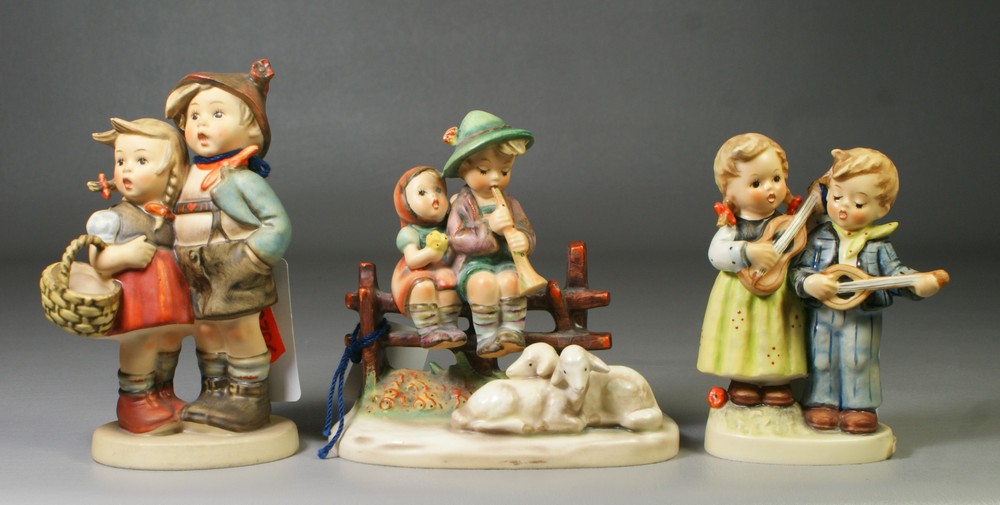 Appraisal: Hummel figurines Eventide Hum Happy Days Hum some crazing Surprise