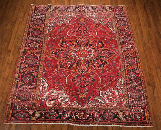 Appraisal: Heriz Rug Second Quarter th Century Red ground with herati