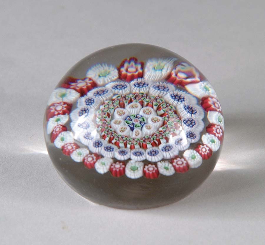 Appraisal: ANTIQUE BACCARAT PAPERWEIGHT Concentric millefiori complex canes with colors of