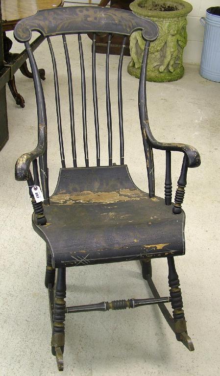 Appraisal: th century ebonised painted Swedish rocker chair with floral details