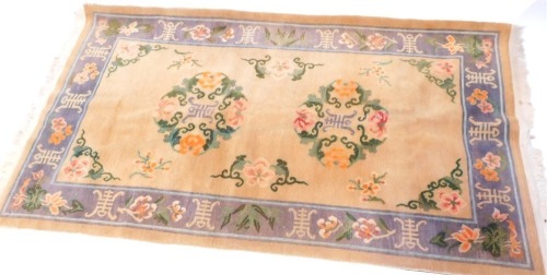 Appraisal: A Chinese cut wool rug on a cream and blue