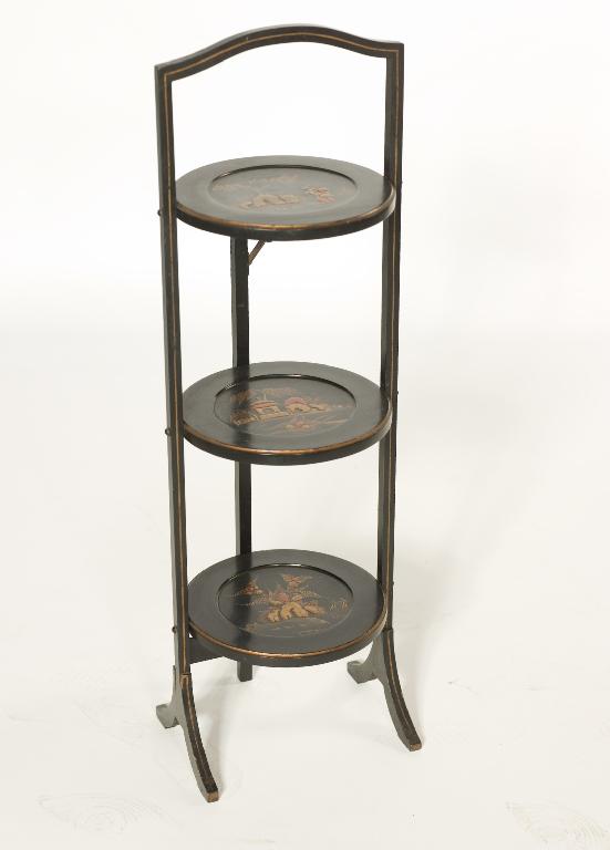 Appraisal: 's EBONISED CHINOISERIE THREE-TIER CAKESTAND each folding tier decorated with