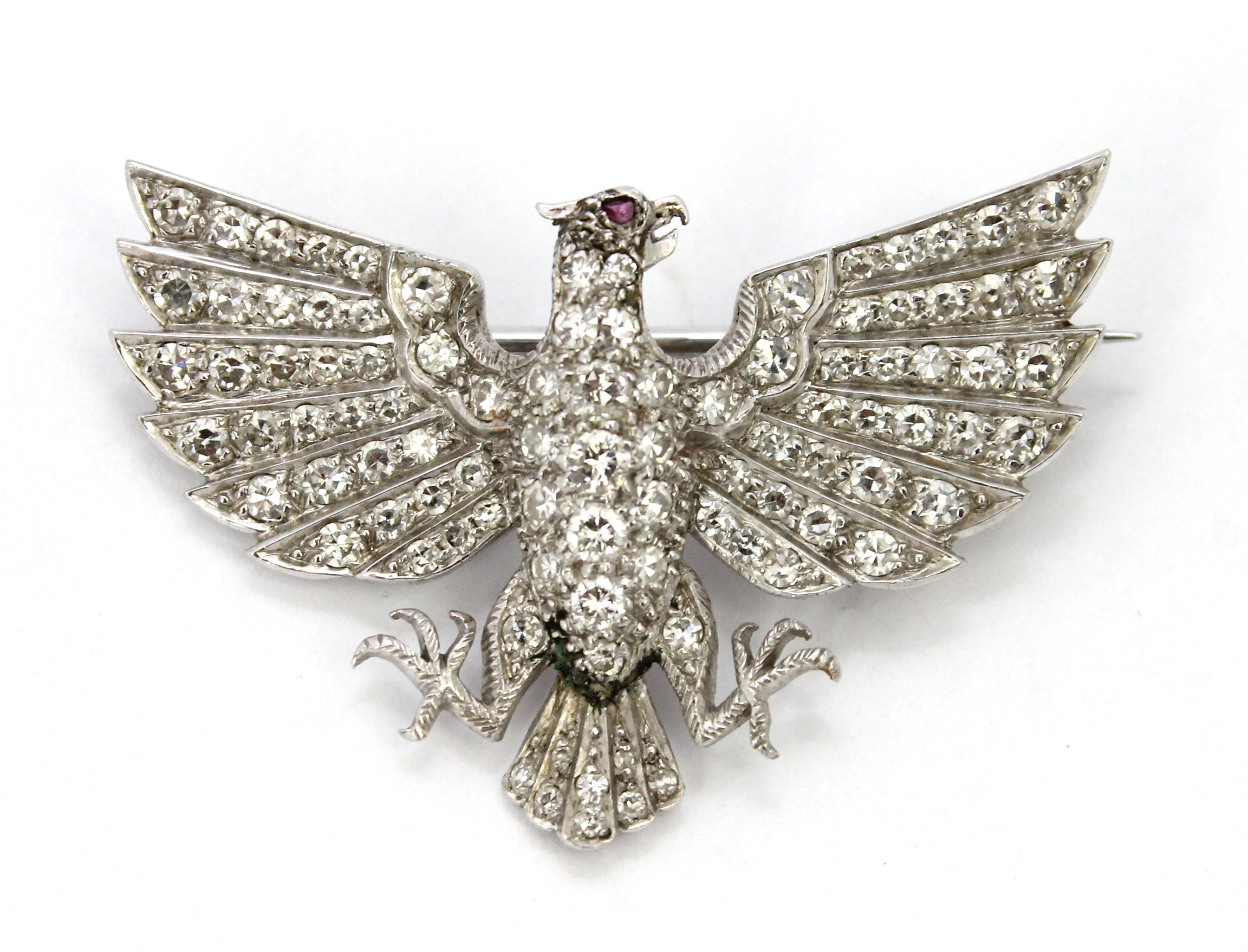 Appraisal: A diamond brooch designed as a bird of prey with