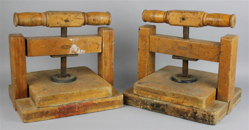 Appraisal: TWO WEBER WOOD PRESSES each with a block and turned