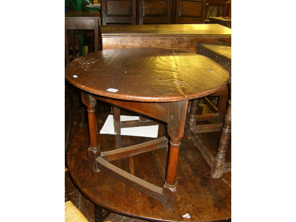 Appraisal: An th century oak cricket table the circular top raised